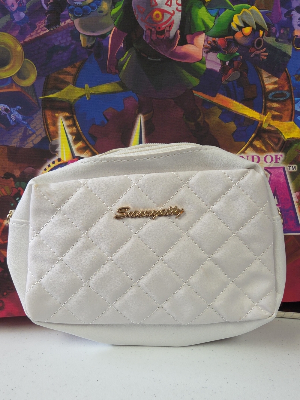 White Quilted Crossbody Bag with Gold Logo Accent